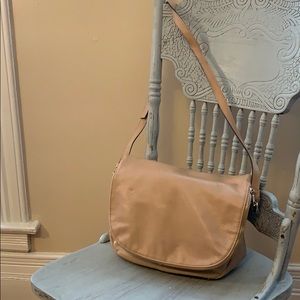 Over the shoulder, faux leather purse.